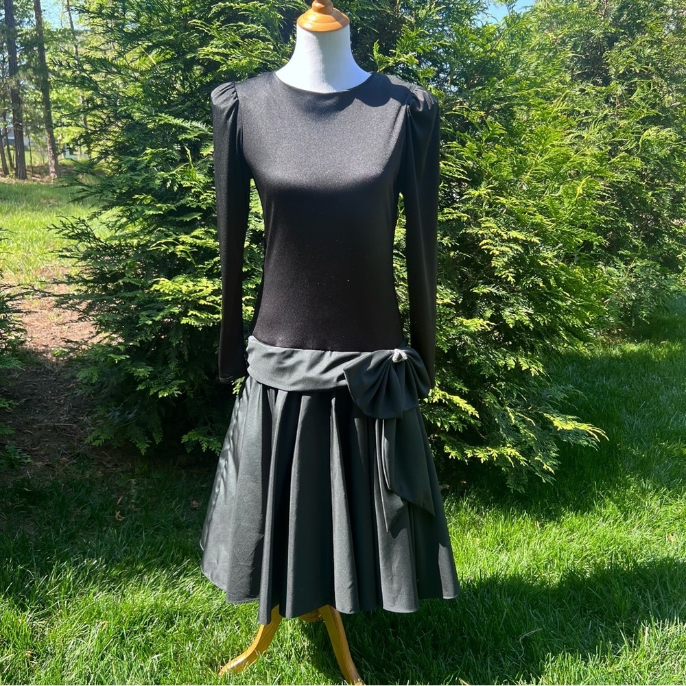 Vintage black midi dress with long sleeves with slightly puffy underskirt